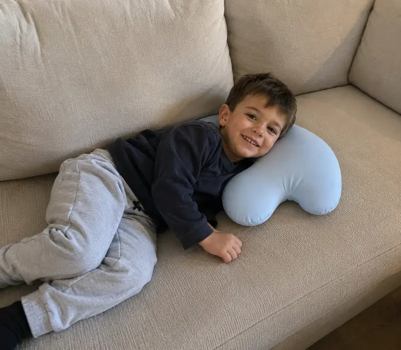 Photo shared by Priya: her son resting on his Booney pillow
